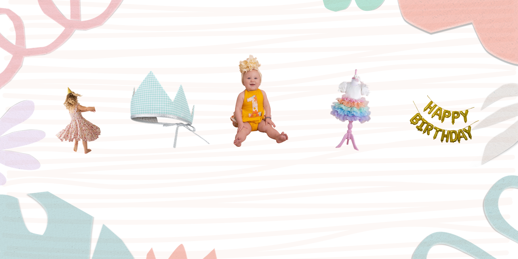 First birthday party supplies including birthday rompers, crowns, dresses, and balloon banners