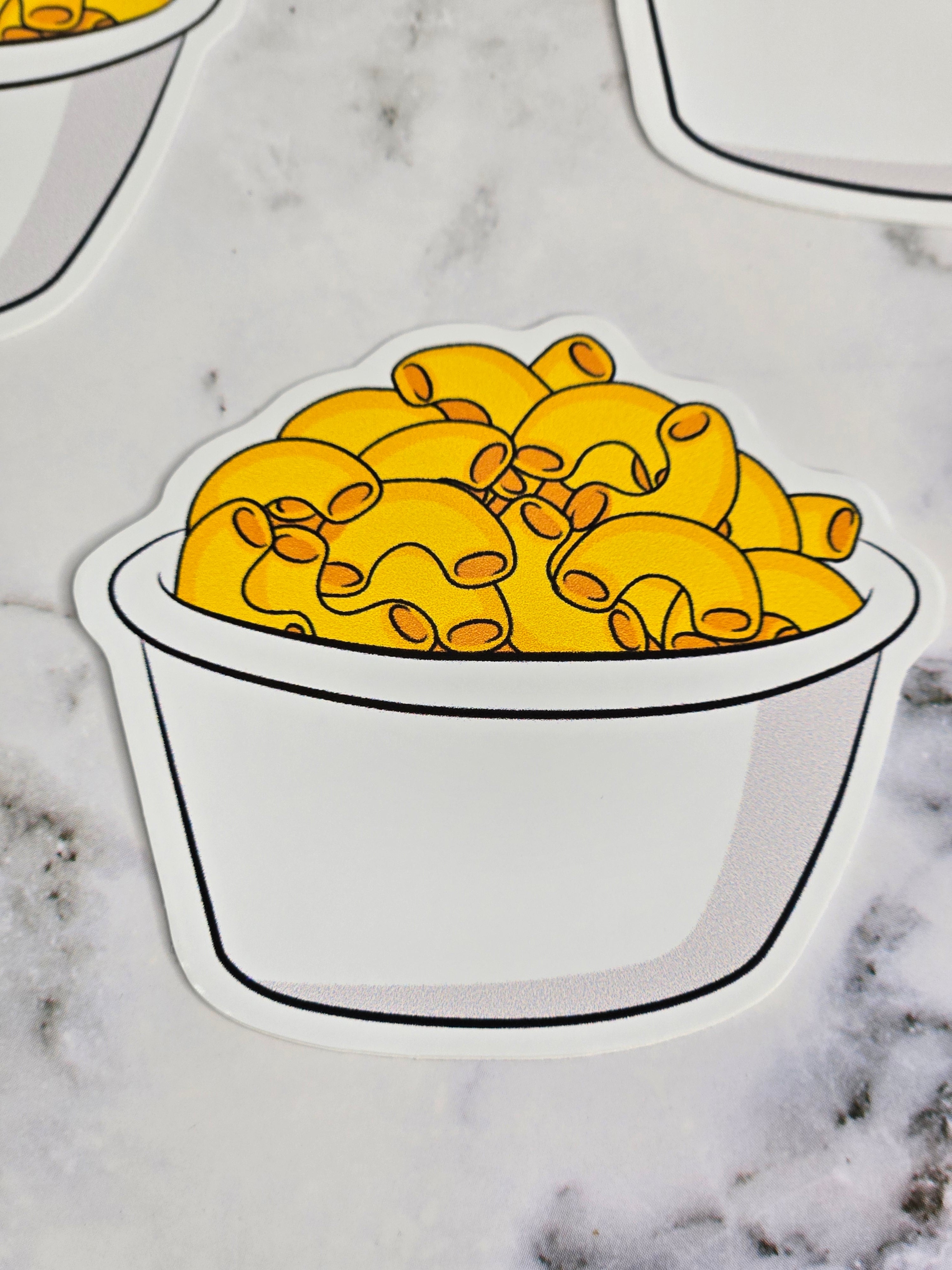 A Bowl Of Nutrious Macaroni And Cheese