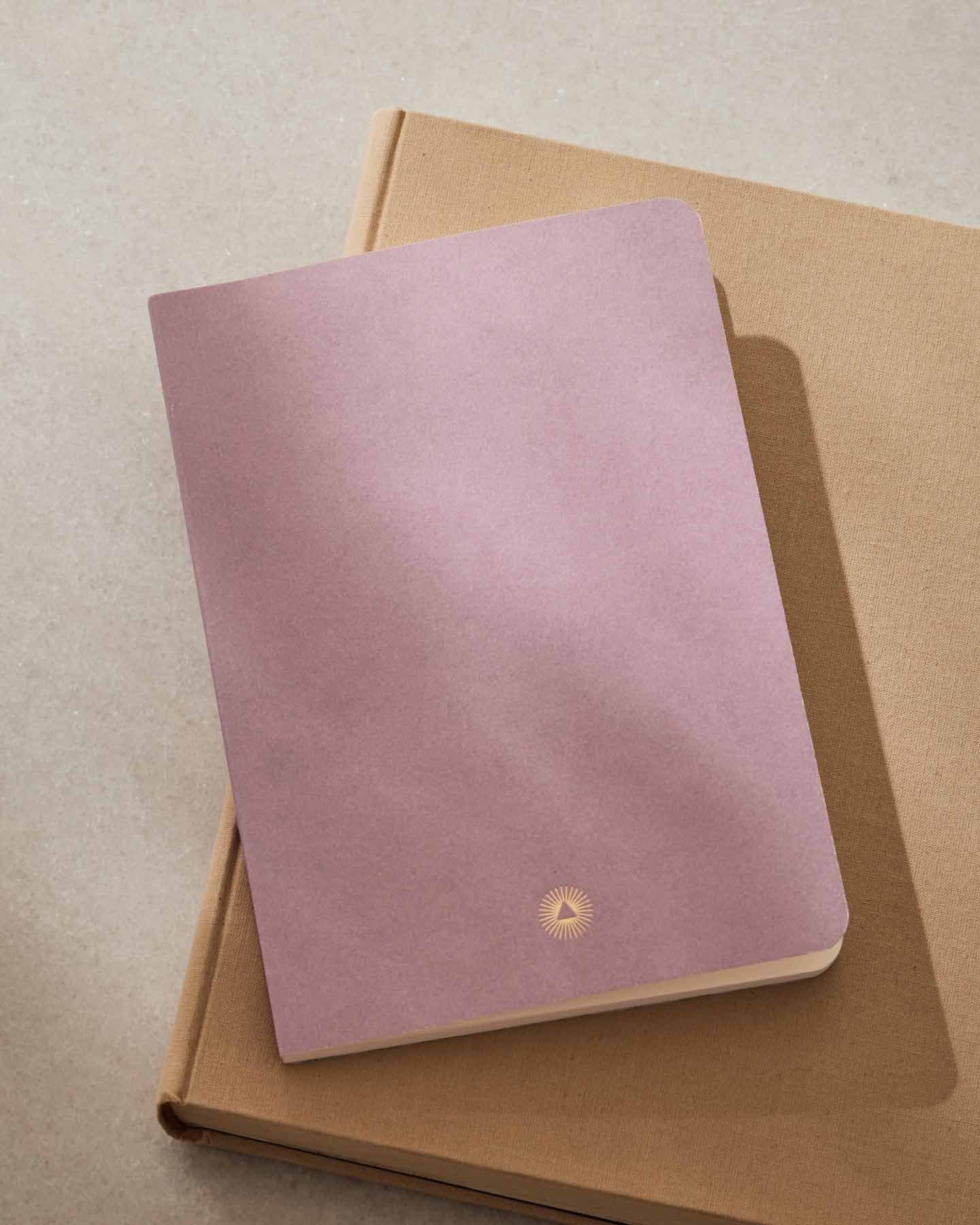 Essential notebook by Intelligent Change created with bespoke paper and made in Germany, Lined long-form journaling notebook with dated pages. Pink