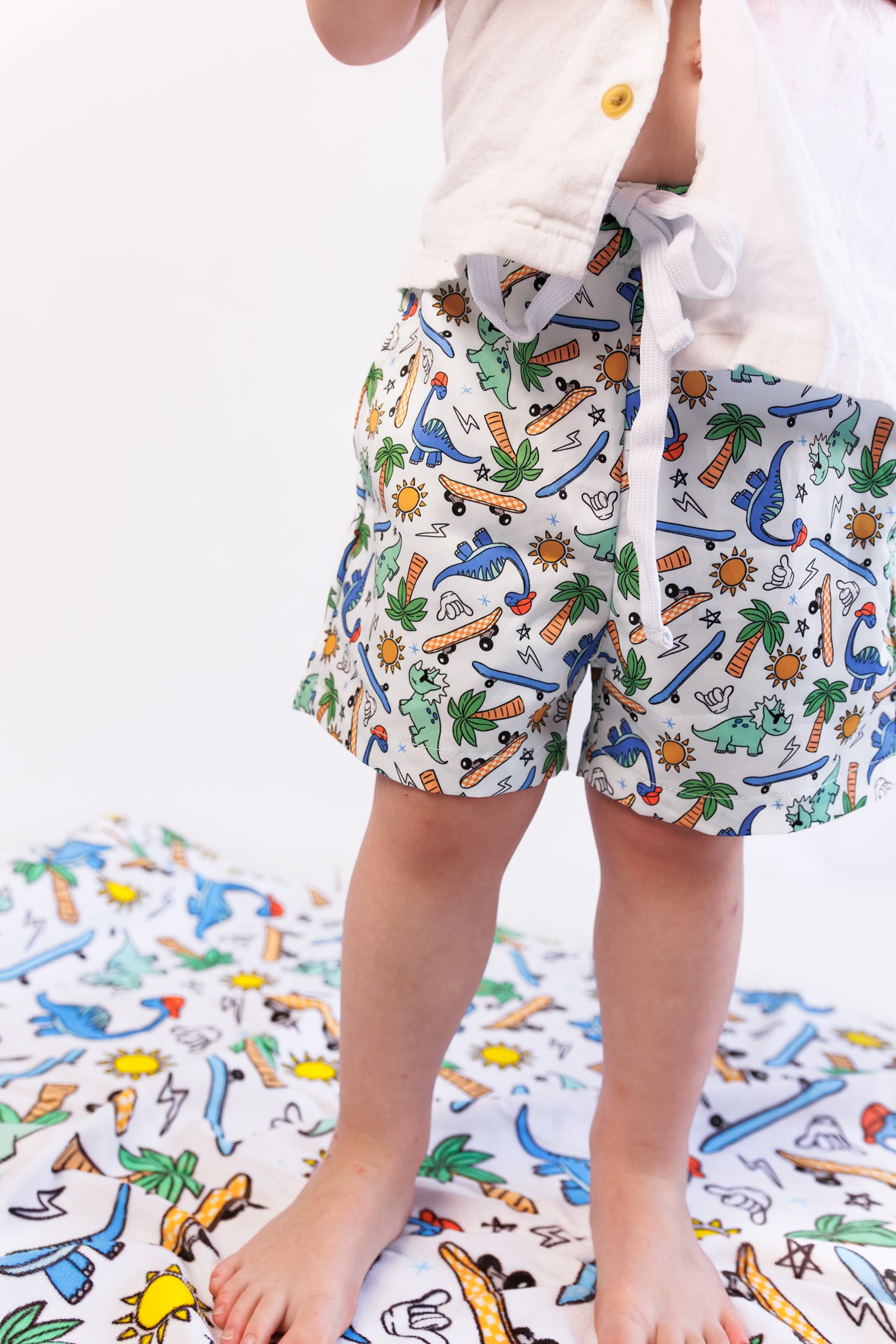 Exclusive Surf-o-saurus Dream Swim Trunks