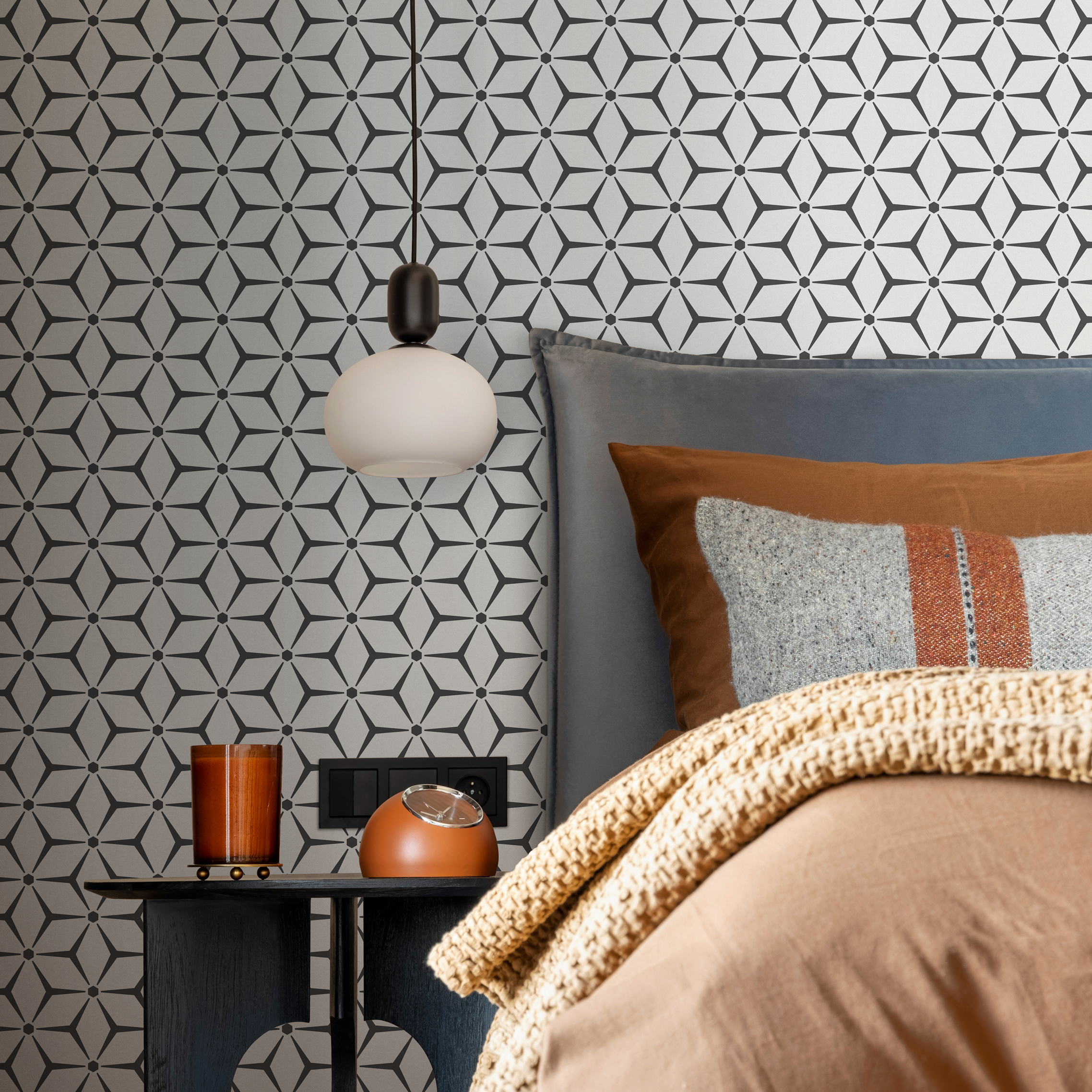Geometric Wallpaper With A Starburst Tile Motif In Black And White - B791