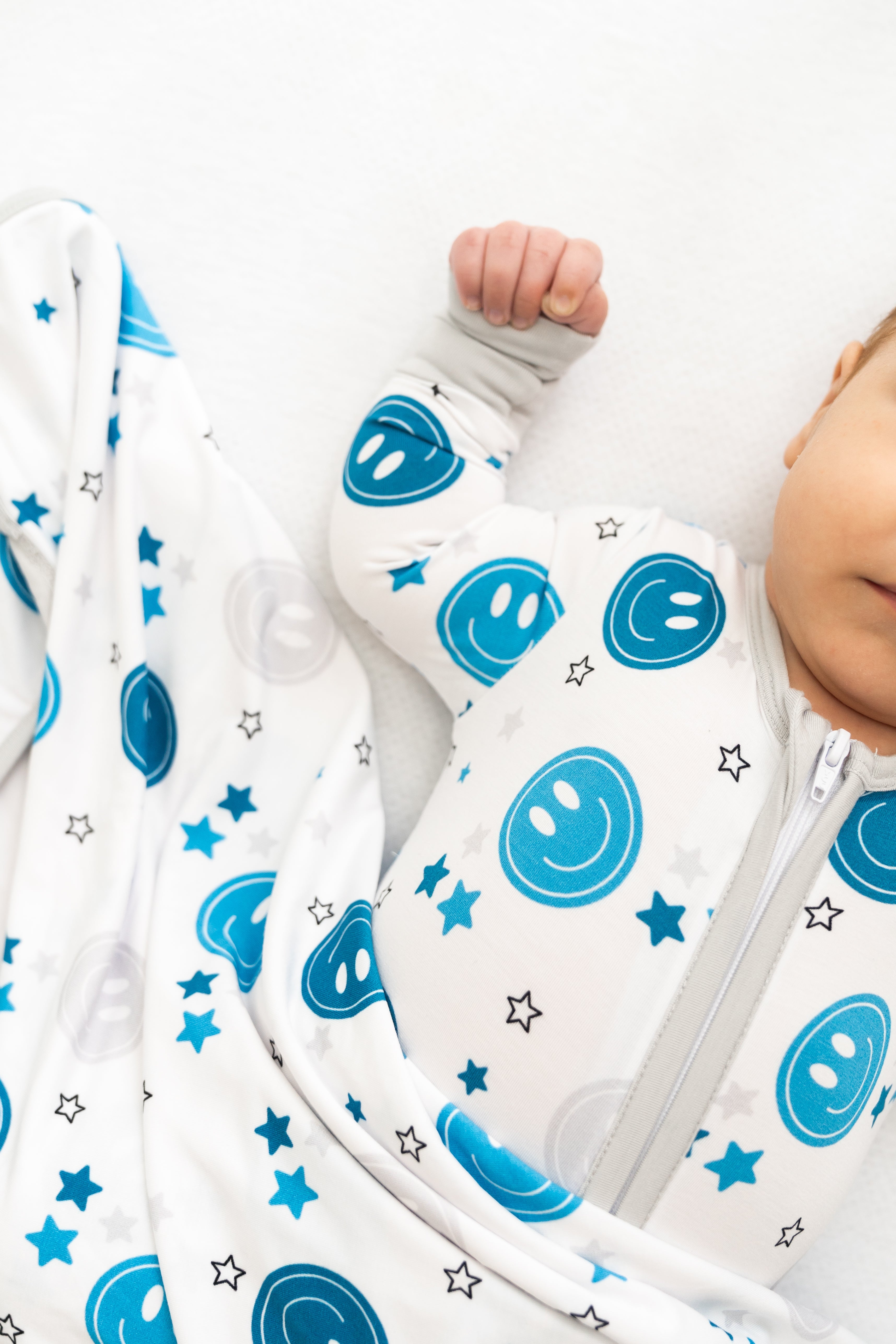 Blue Smiley Coverall