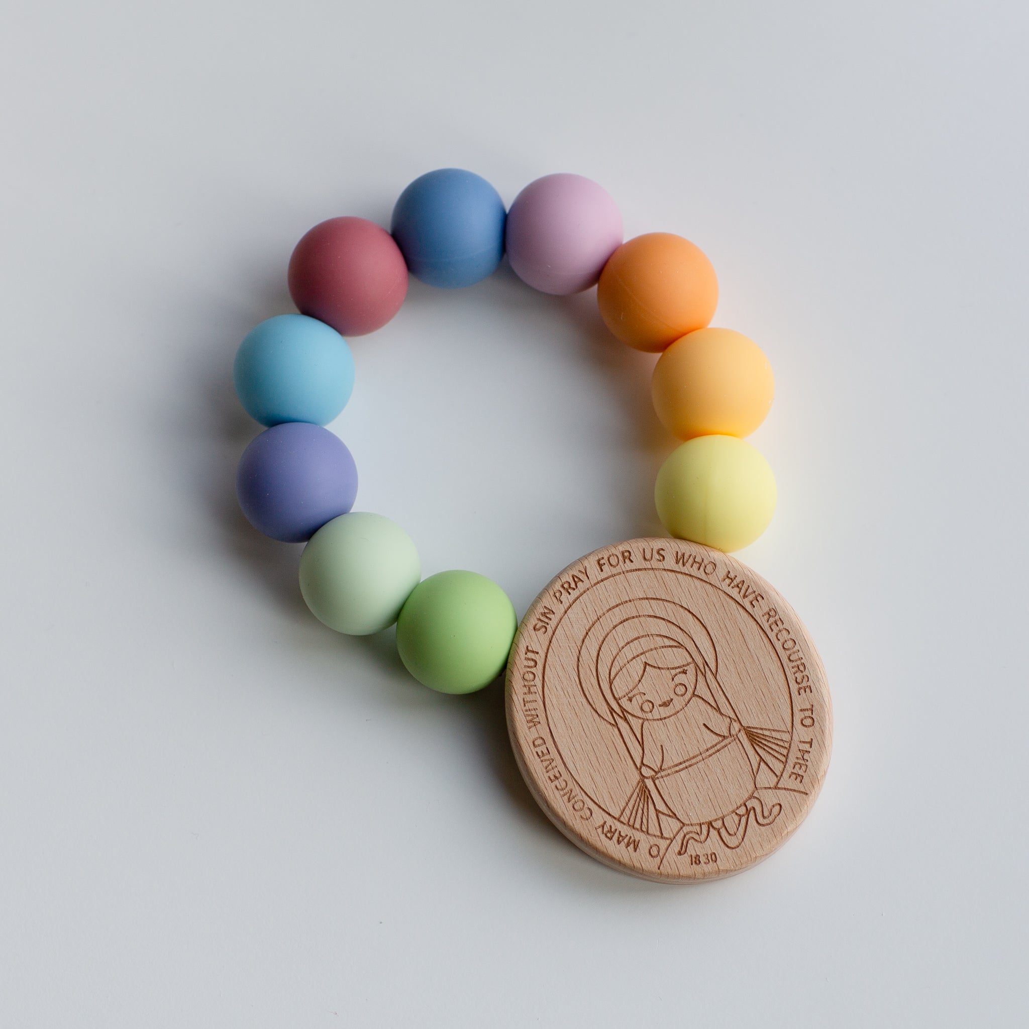 Baby's First Miraculous Medal Teether - Rainbow Of Hope