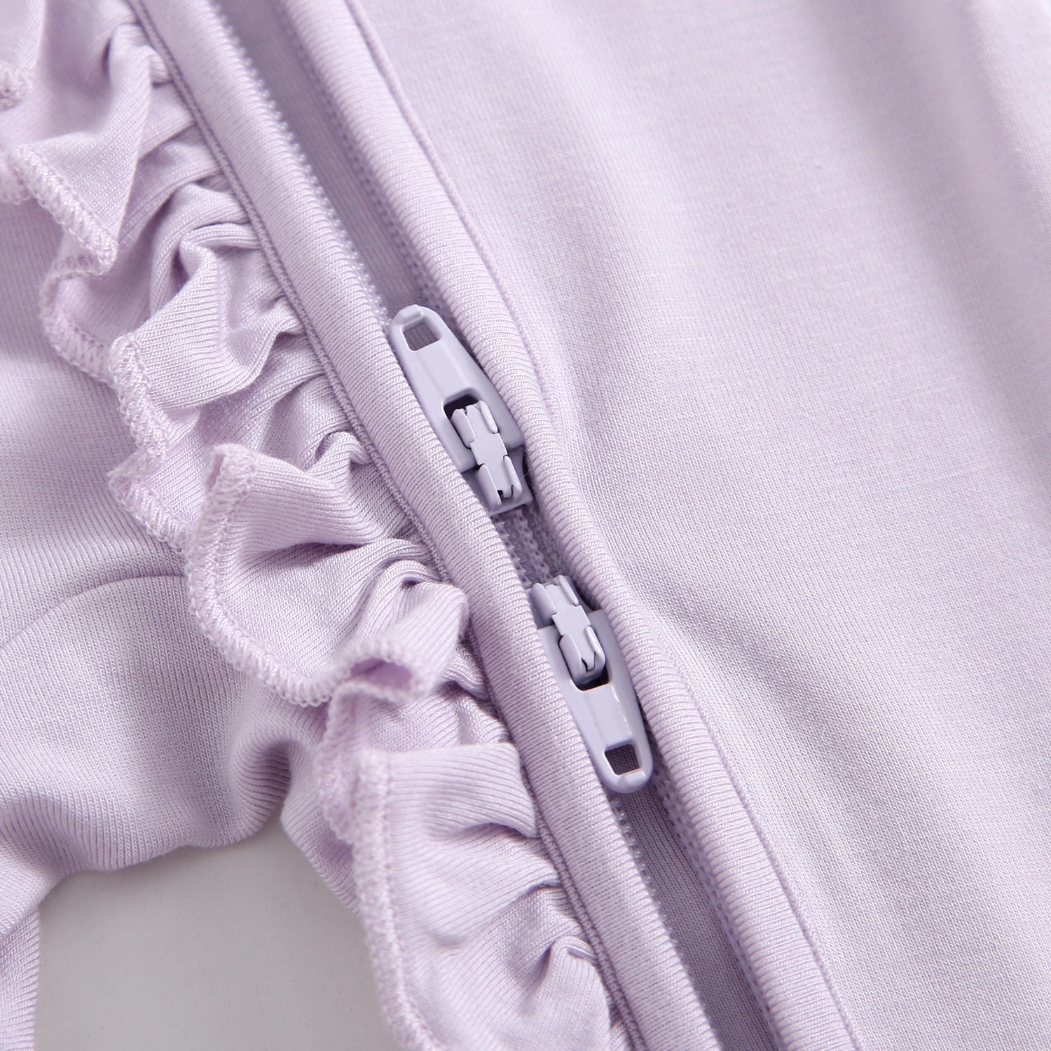 Wisteria Ruffled Zippered Baby Romper