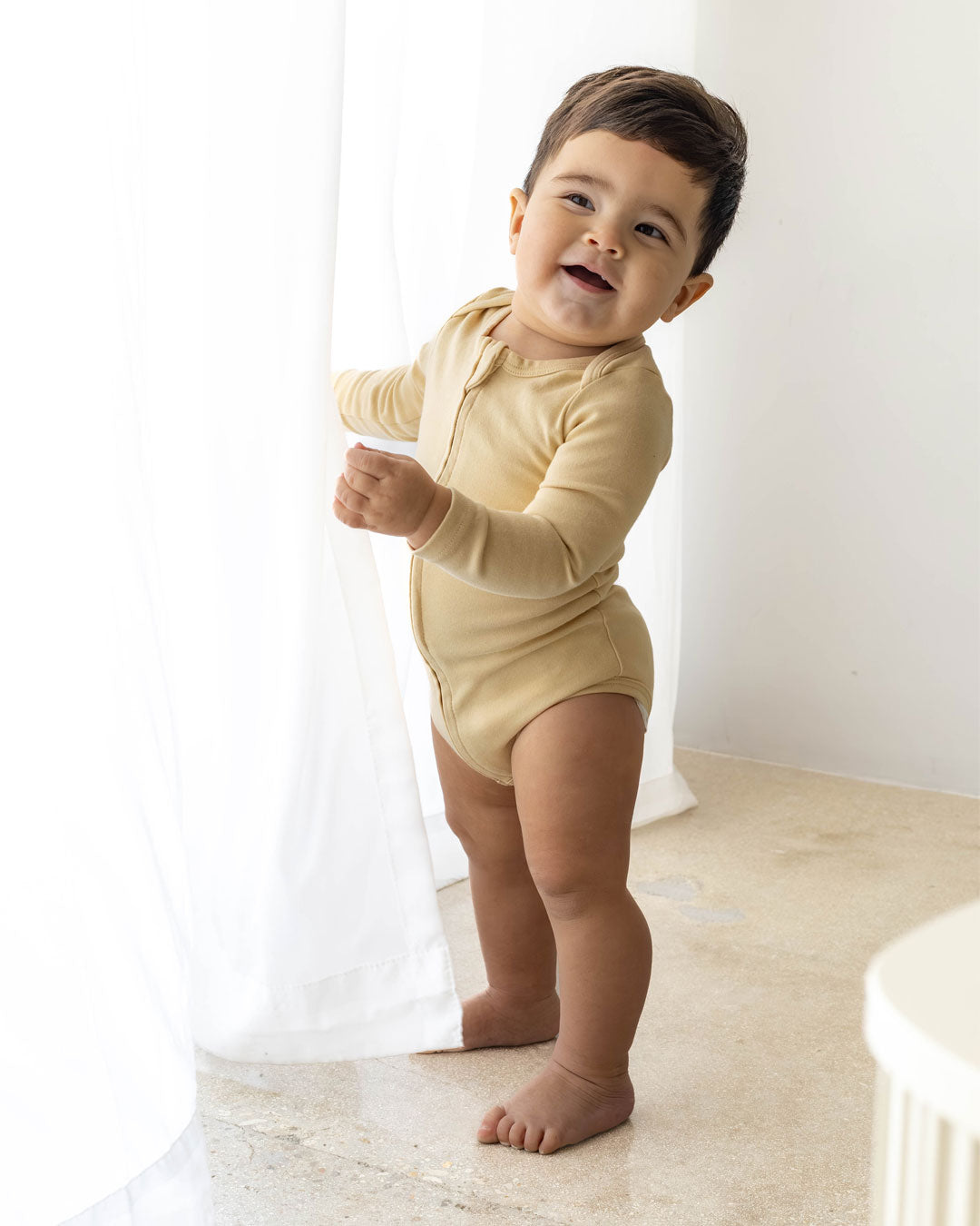 Long Sleeve Zipper Bodysuit In Latte, 3-6m