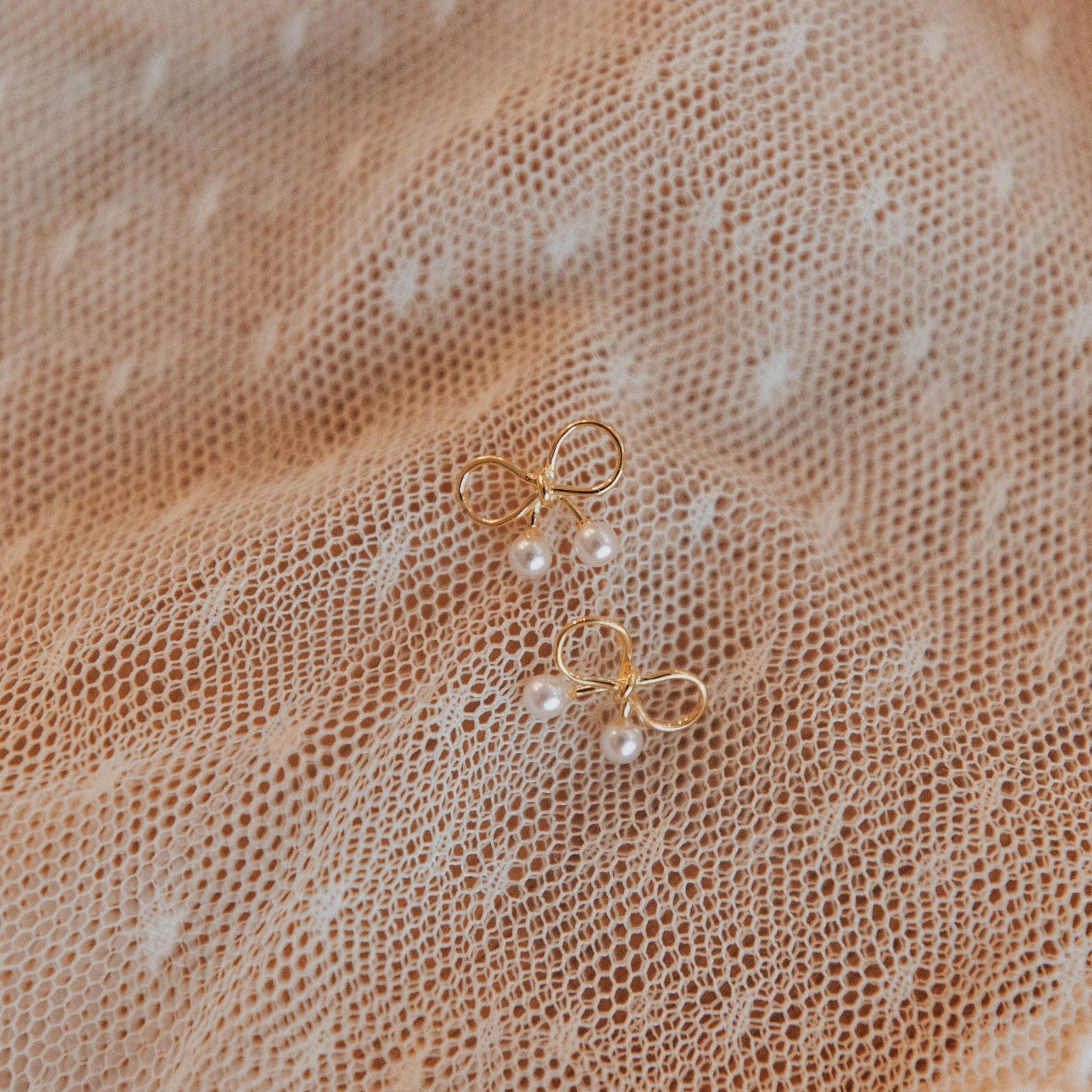 Mila Pearl And Gold Bow Studs