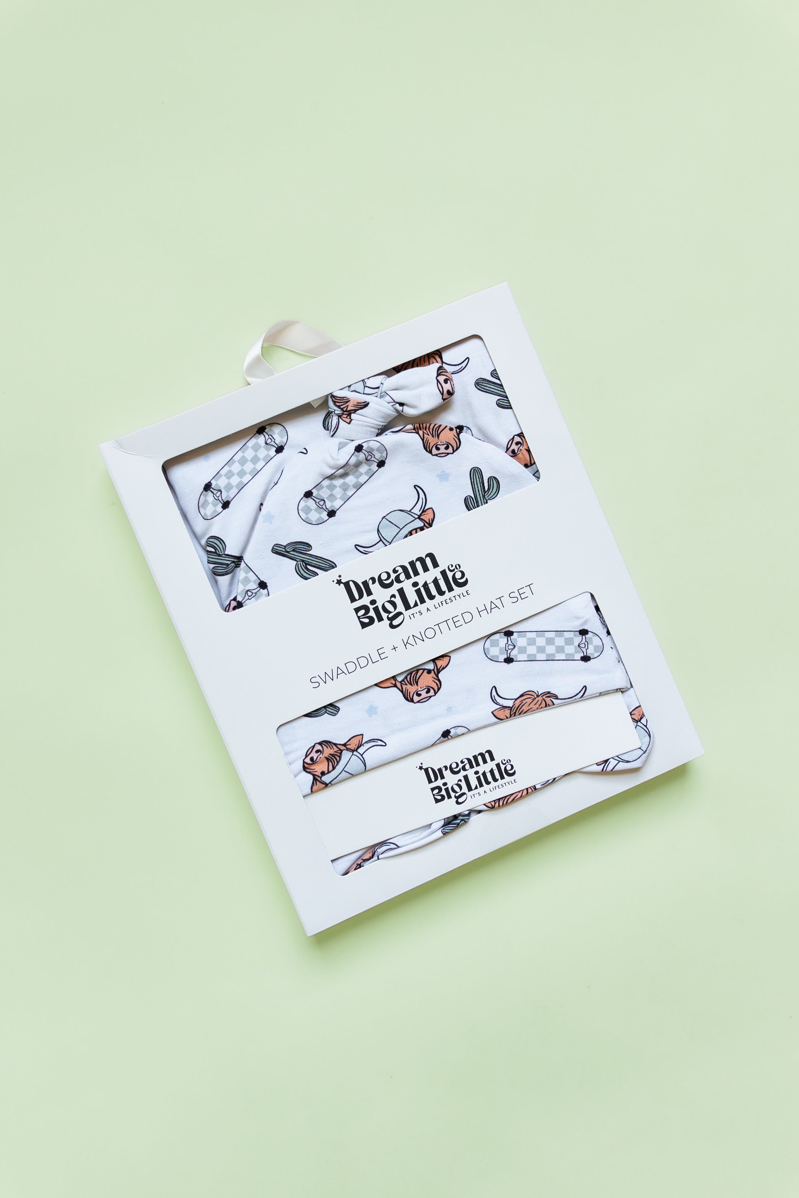 Exclusive Moo-ving Fast Dream Swaddle & Beanie