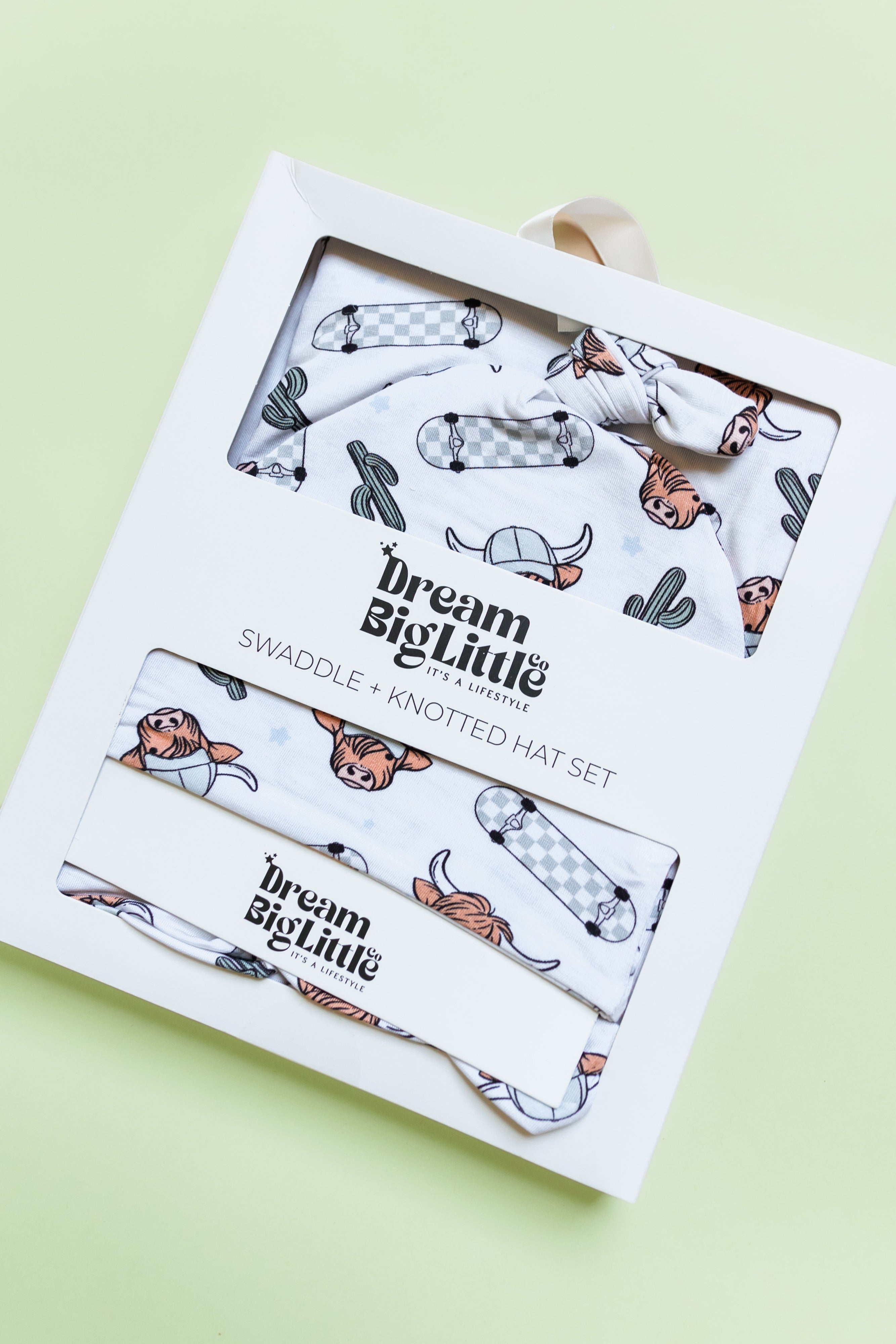 Exclusive Moo-ving Fast Dream Swaddle & Beanie