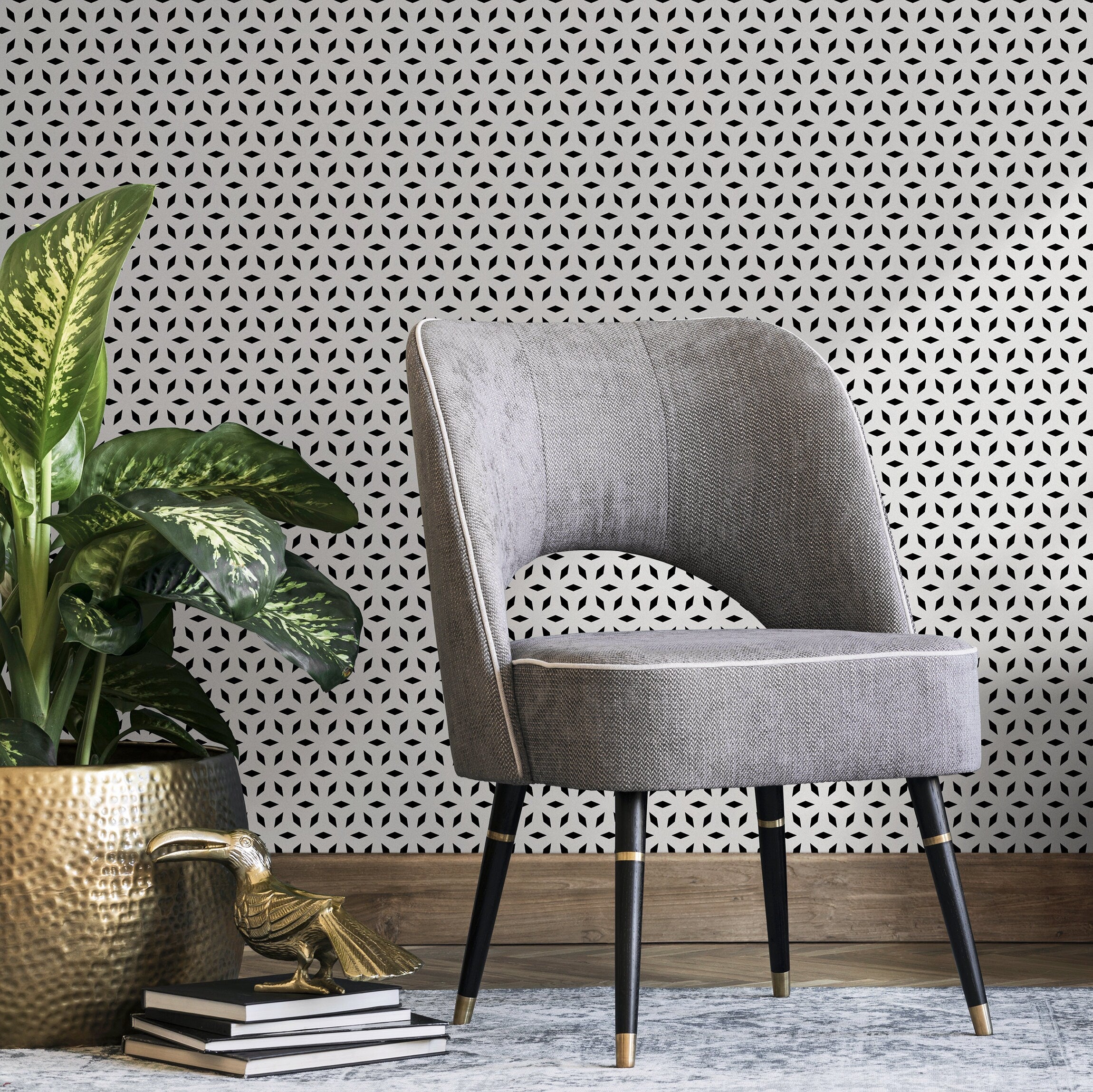 Geometric Wallpaper With A Repeating Starburst Motif In Black And White - B252