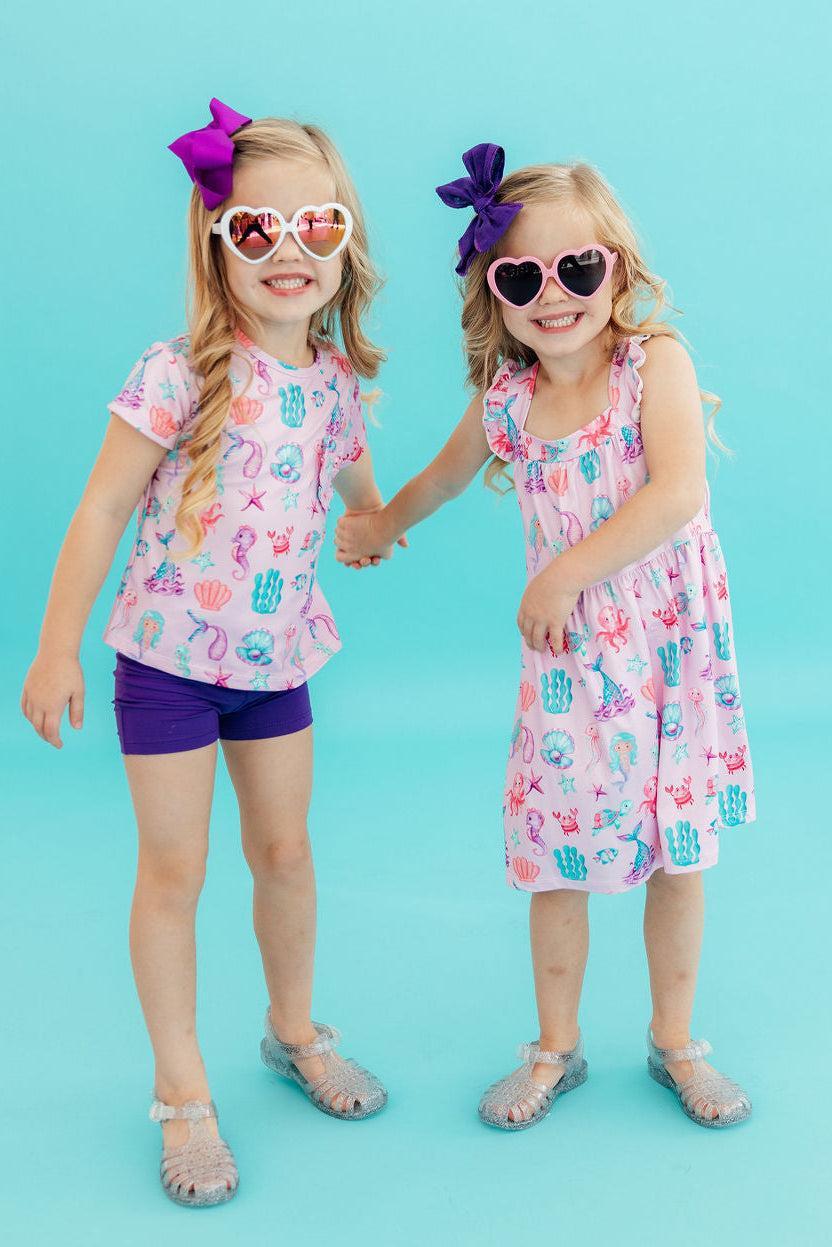 Under The Sea Ruffle Cross Back Dress