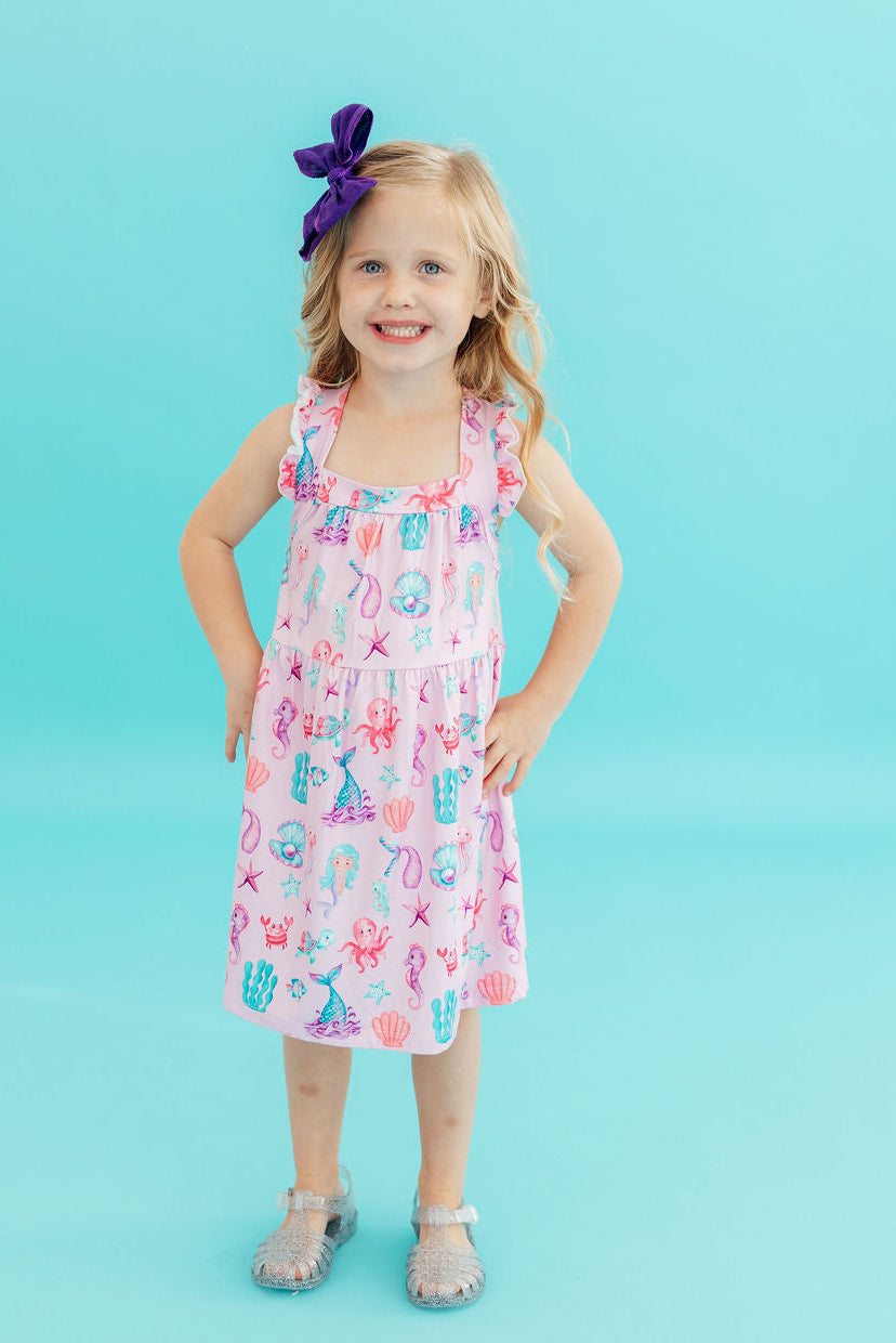 Under The Sea Ruffle Cross Back Dress