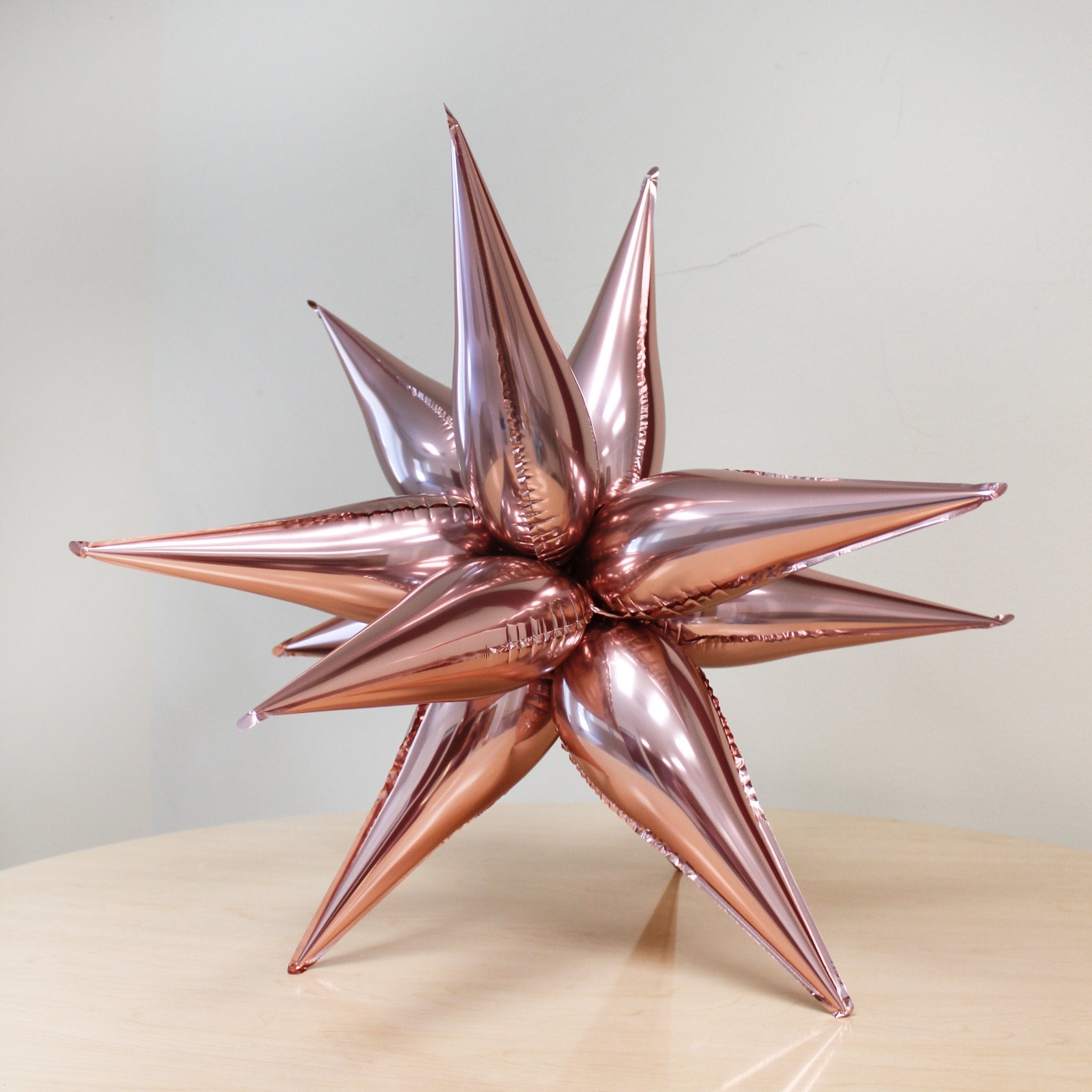 Rose Gold Starburst Balloon