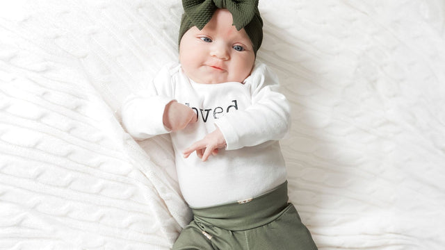 Six-month-old baby sitting up