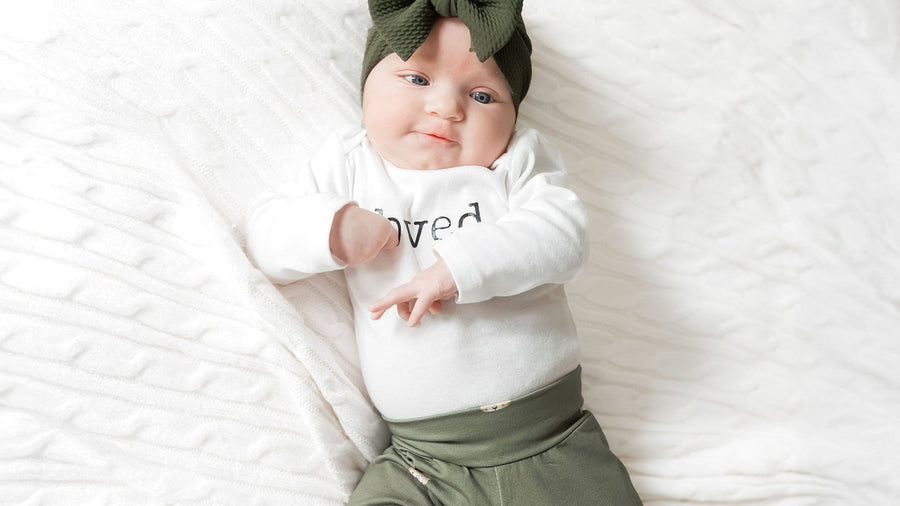 Six-month-old baby sitting up