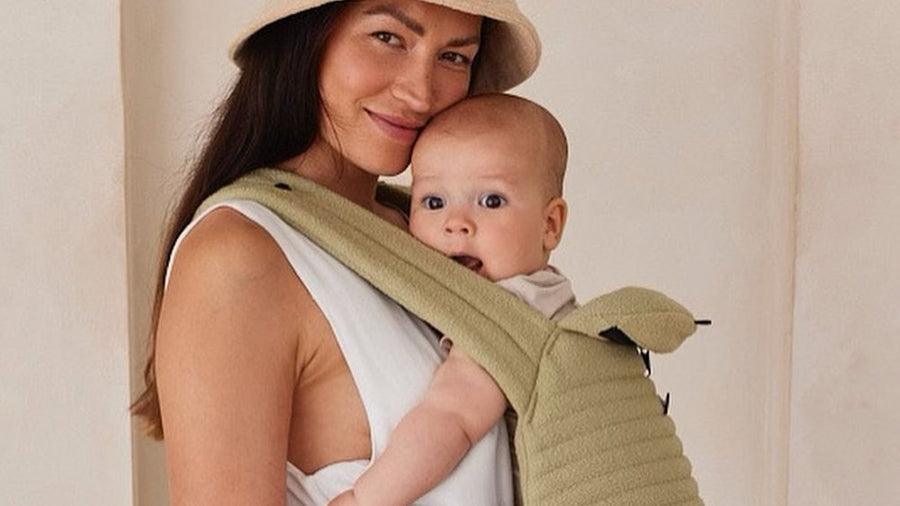 Parent babywearing their baby