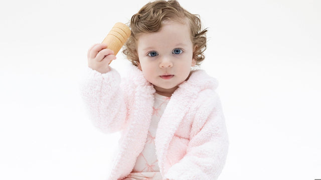 Baby in a soft pink Angel Dear outfit — best baby clothing brands 2026 guide from EasyTot