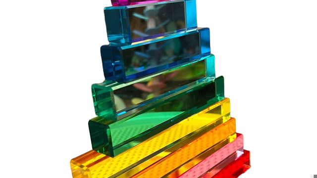 Colorful wooden building blocks stacked