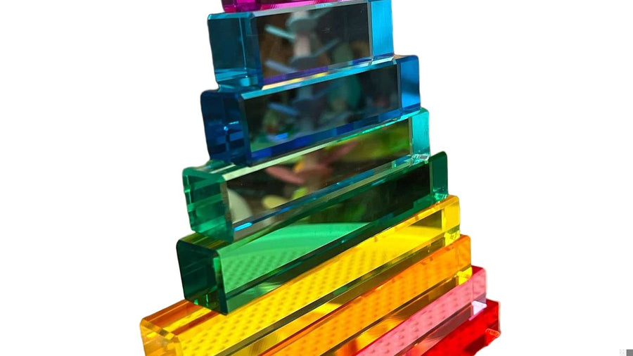 Colorful wooden building blocks stacked