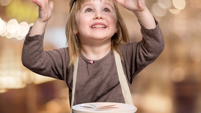 Young child playing with musical toys