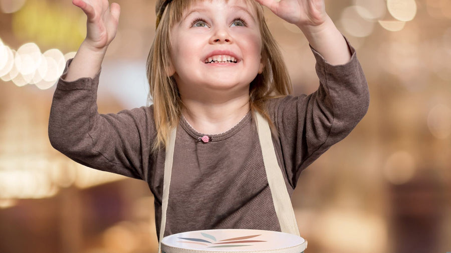 Young child playing with musical toys