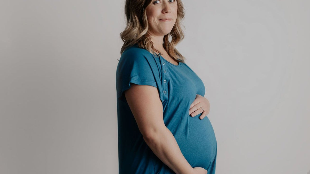 Pregnant woman in a teal dress