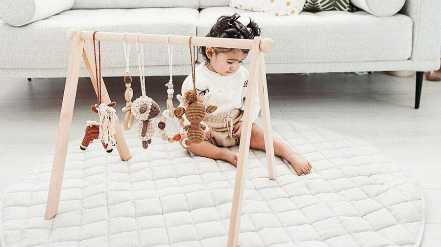 Baby playing on a mat