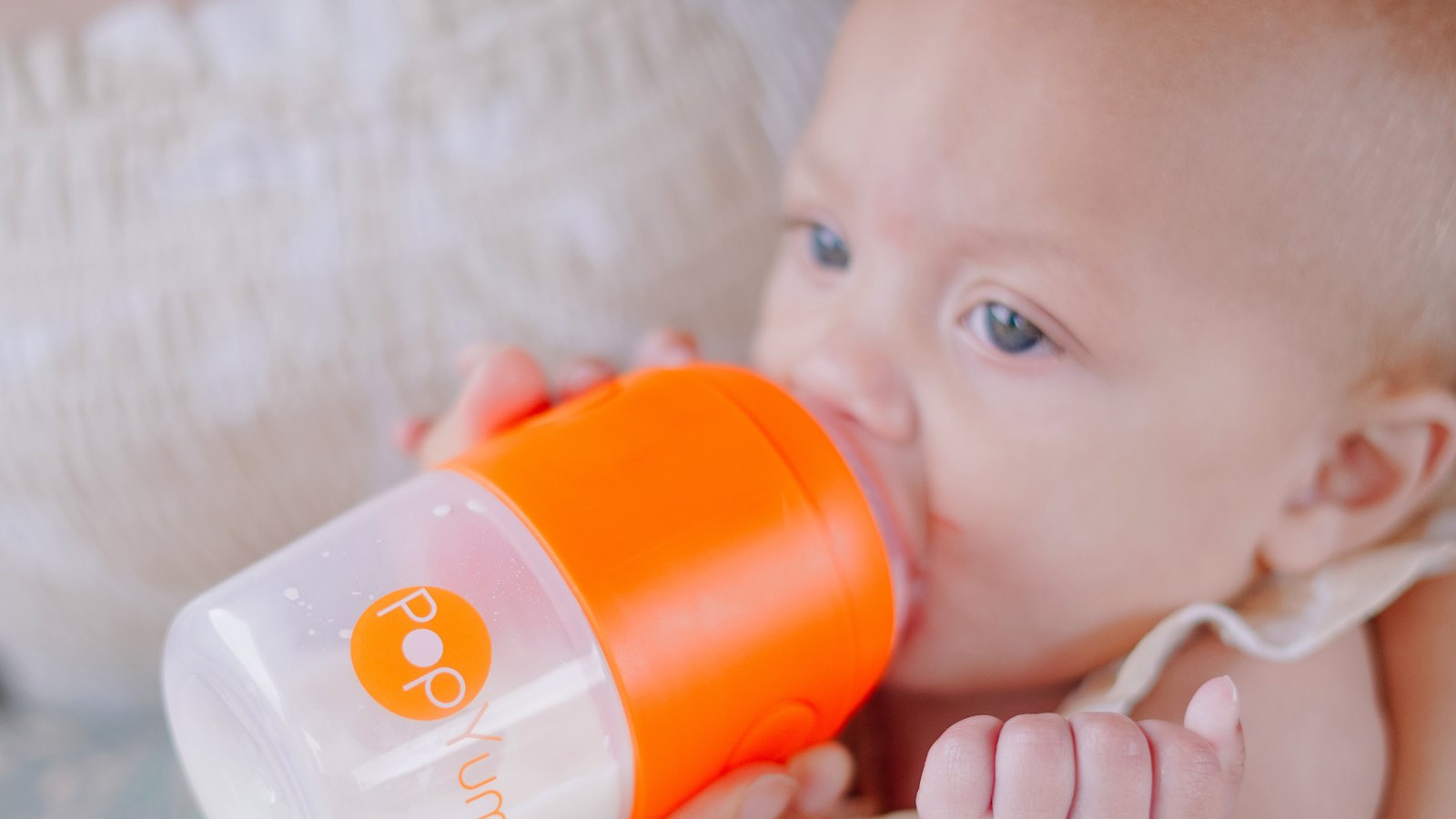 Baby feeding from a bottle