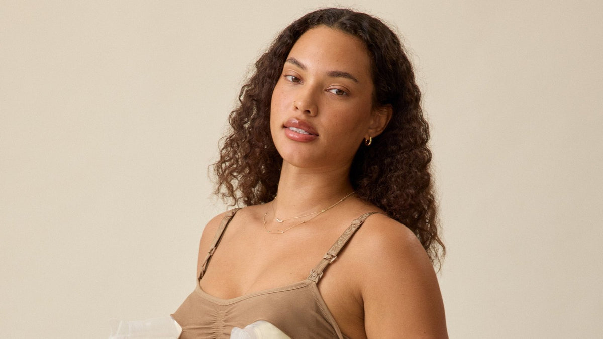 Model wearing the Kindred Bravely Sublime hands-free pumping nursing bra in latte