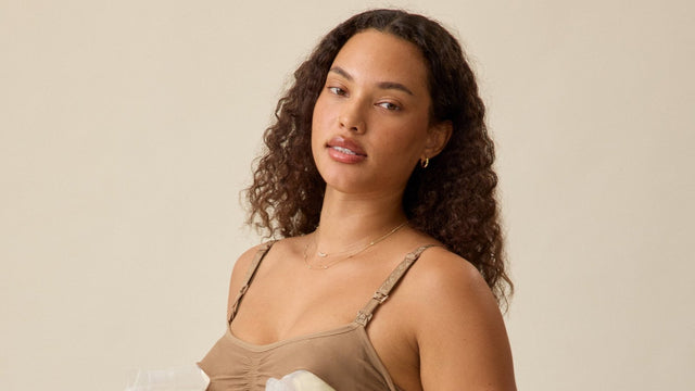 Model wearing the Kindred Bravely Sublime hands-free pumping nursing bra in latte