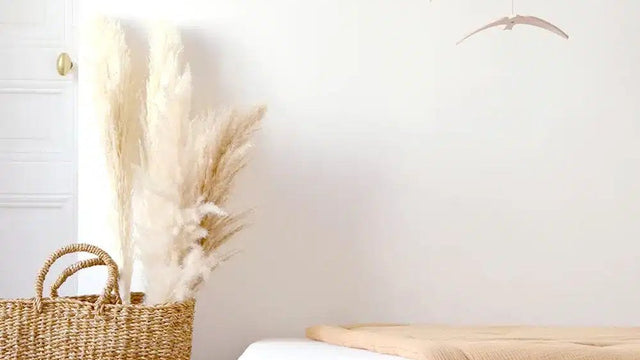 Calm nursery setup with a mobile