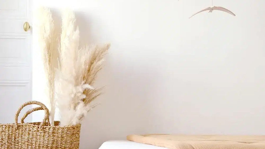 Calm nursery setup with a mobile