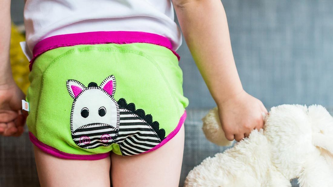 Toddler in training pants during potty training