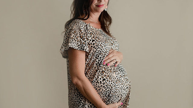Pregnant woman in a floral dress