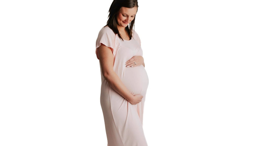 Pregnant woman in a nightgown