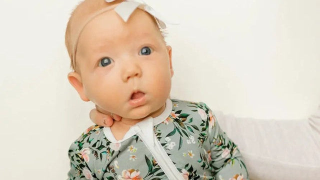 Baby in floral bamboo pajamas