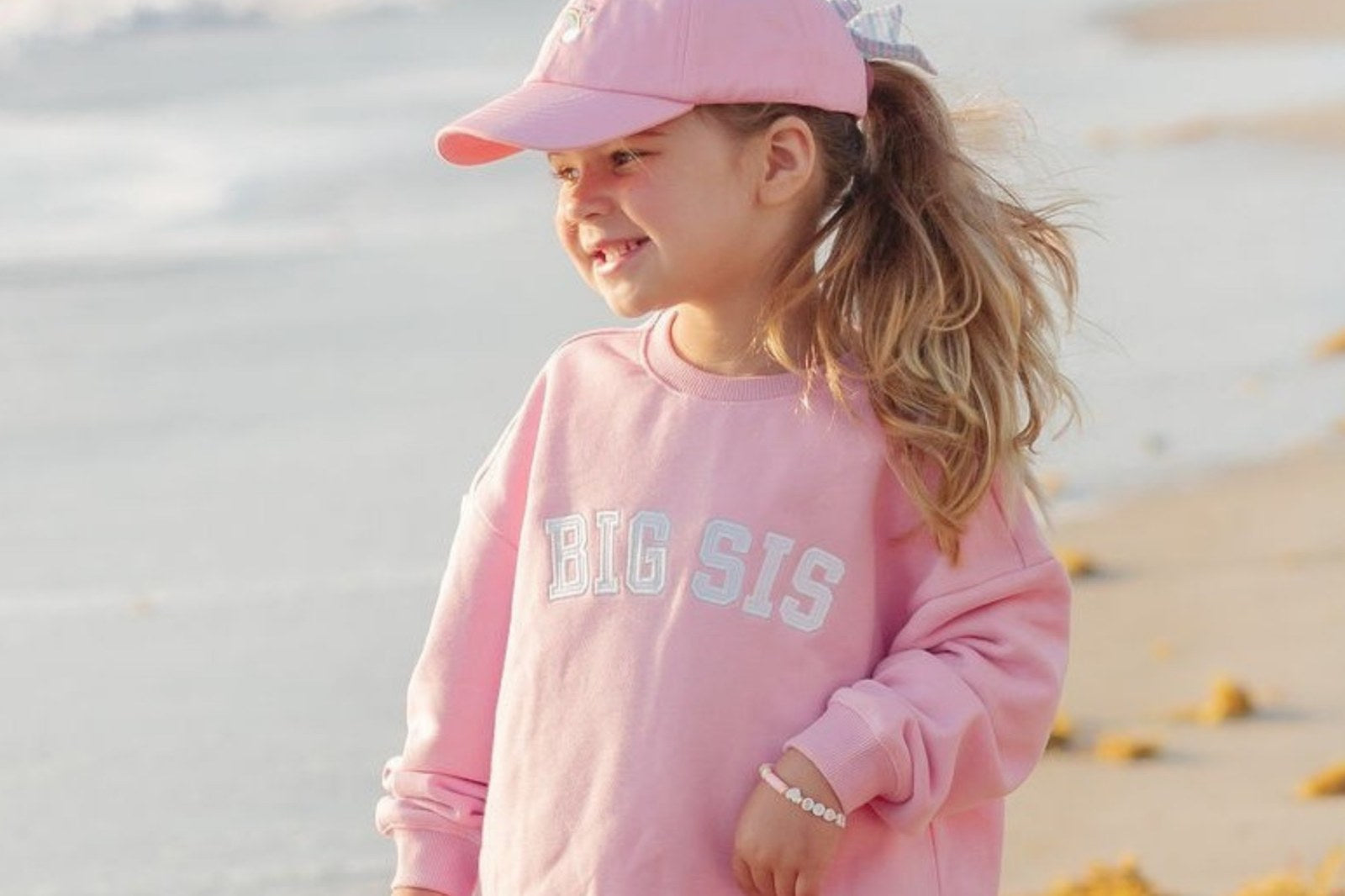 Girl wearing activewear at the beach