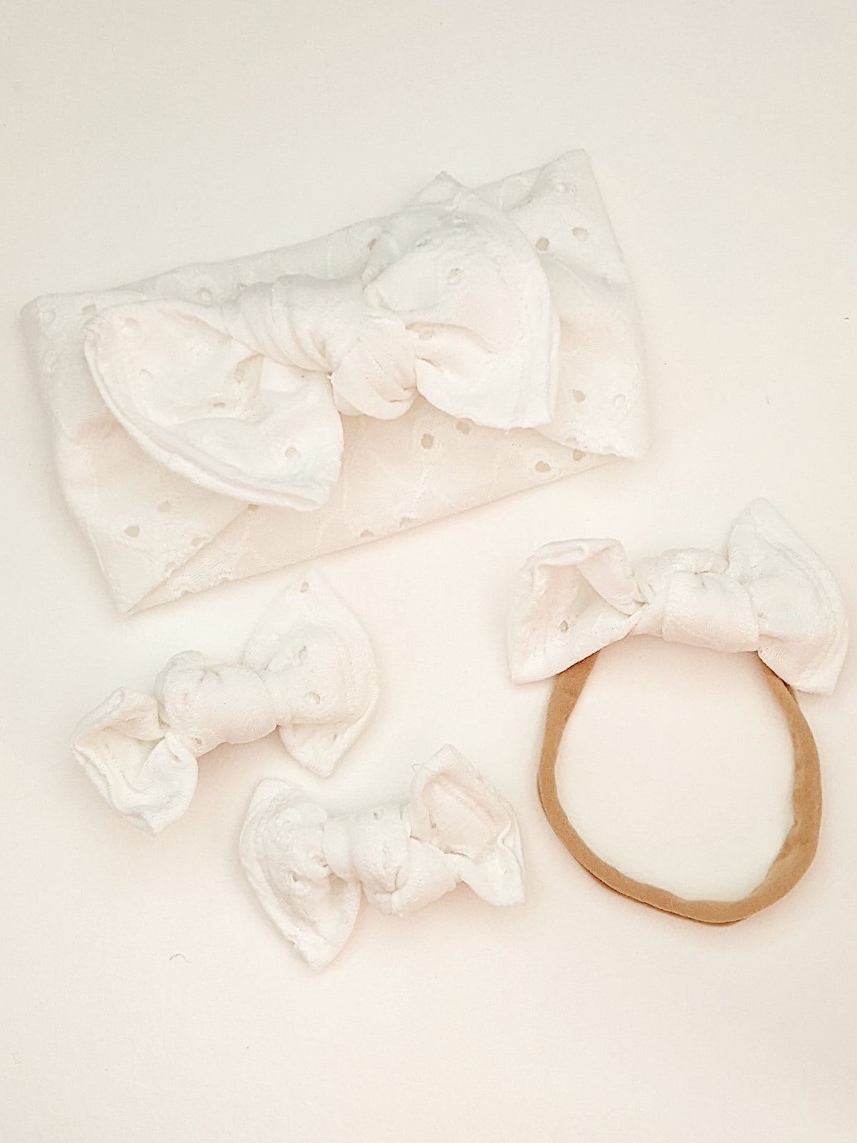 Ivory Eyelet Bows