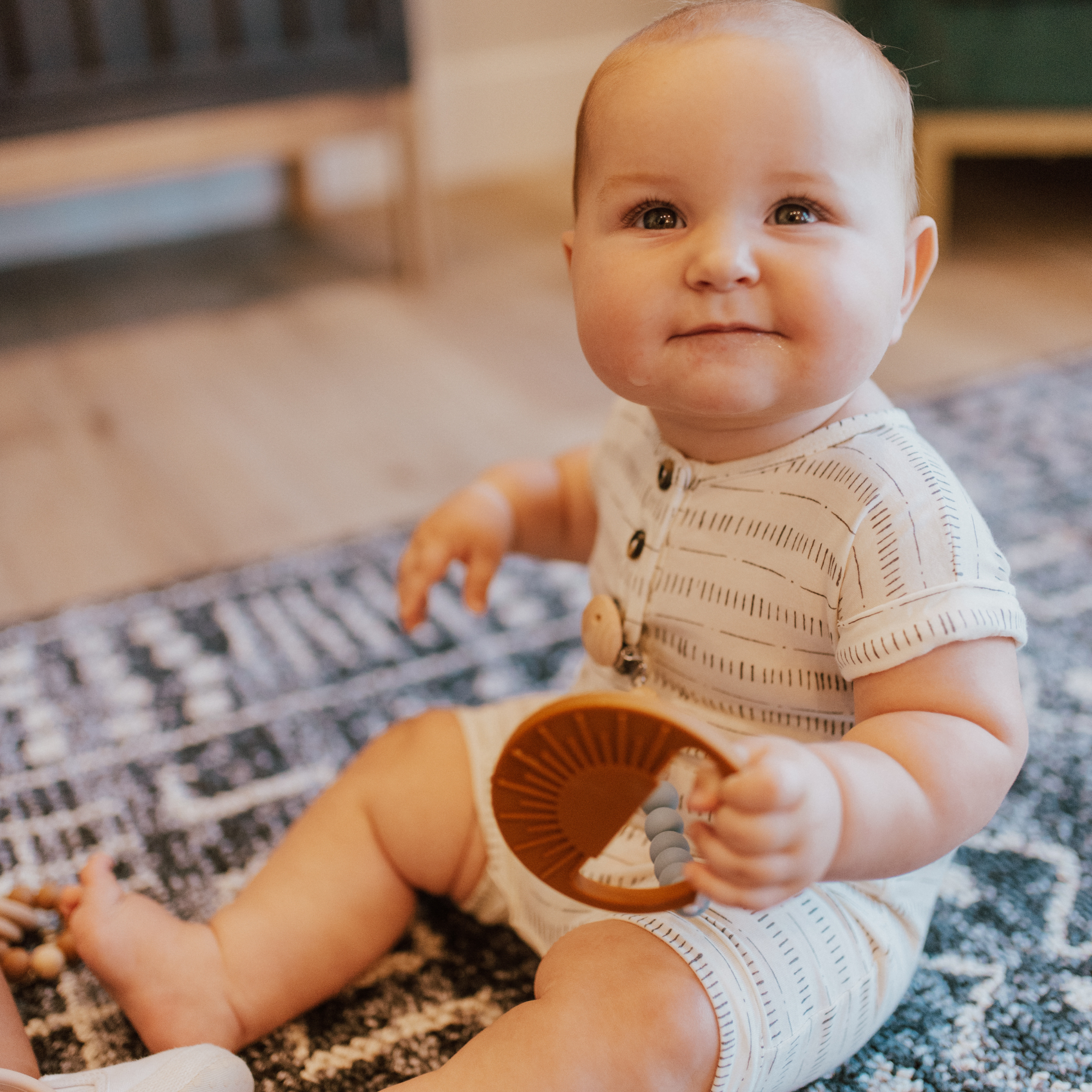 Teal Sunburst Teething Toy