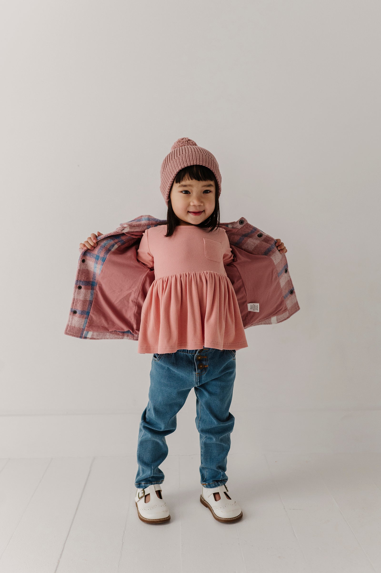 Girls Ribbed Peplum Shirt In Mellow Rose