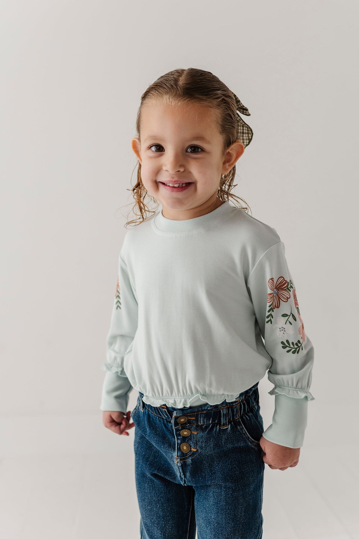 Girls Ruffle Hem Sweatshirt In Floral Sleeves In Misty Blue
