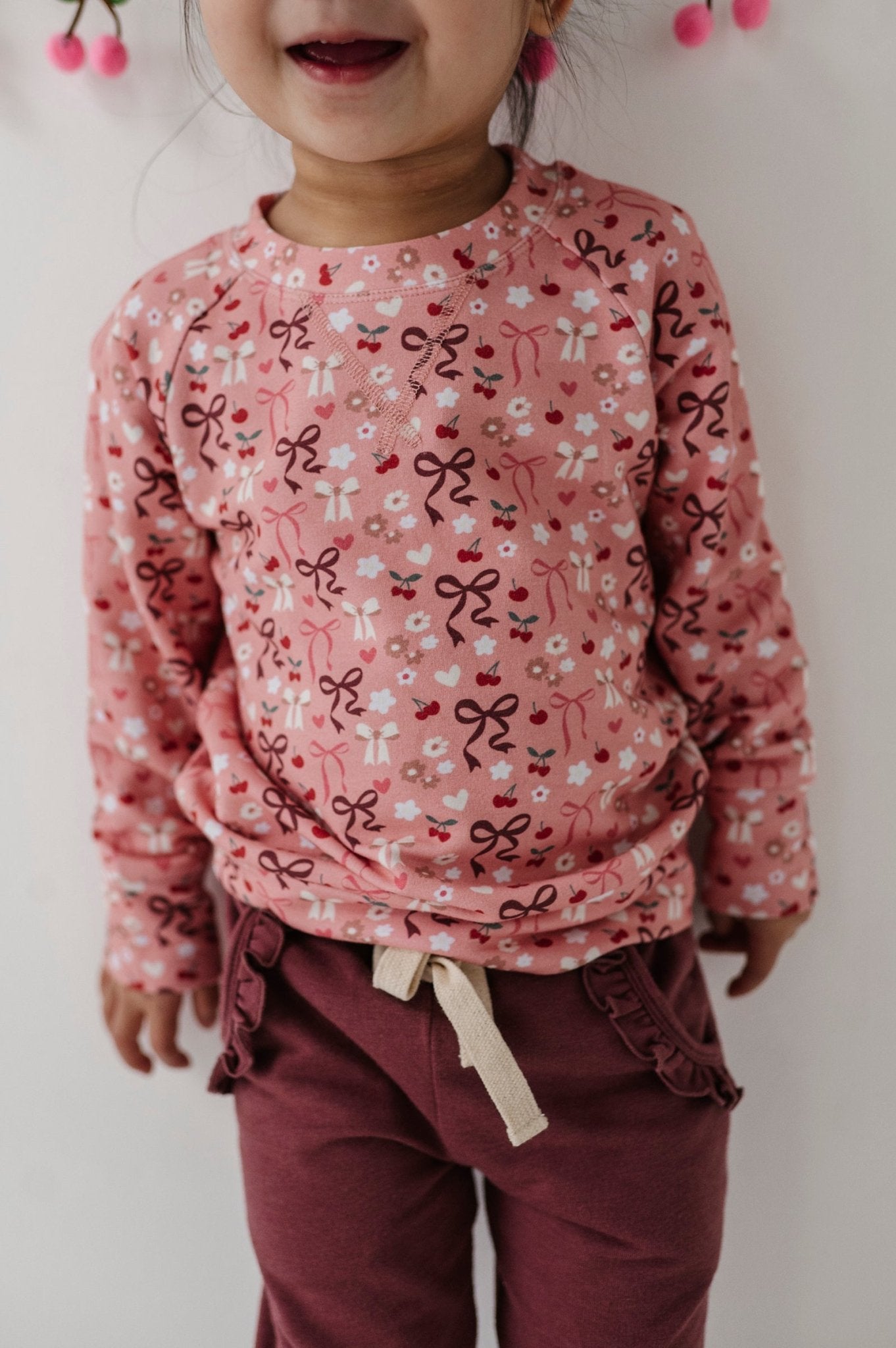 Girls Raglan Sweatshirt In Cherry Hearts