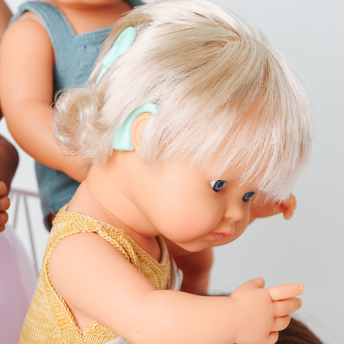 Baby Doll Caucasian Girl With Hearing Implant 15” (Ochre Rompers)