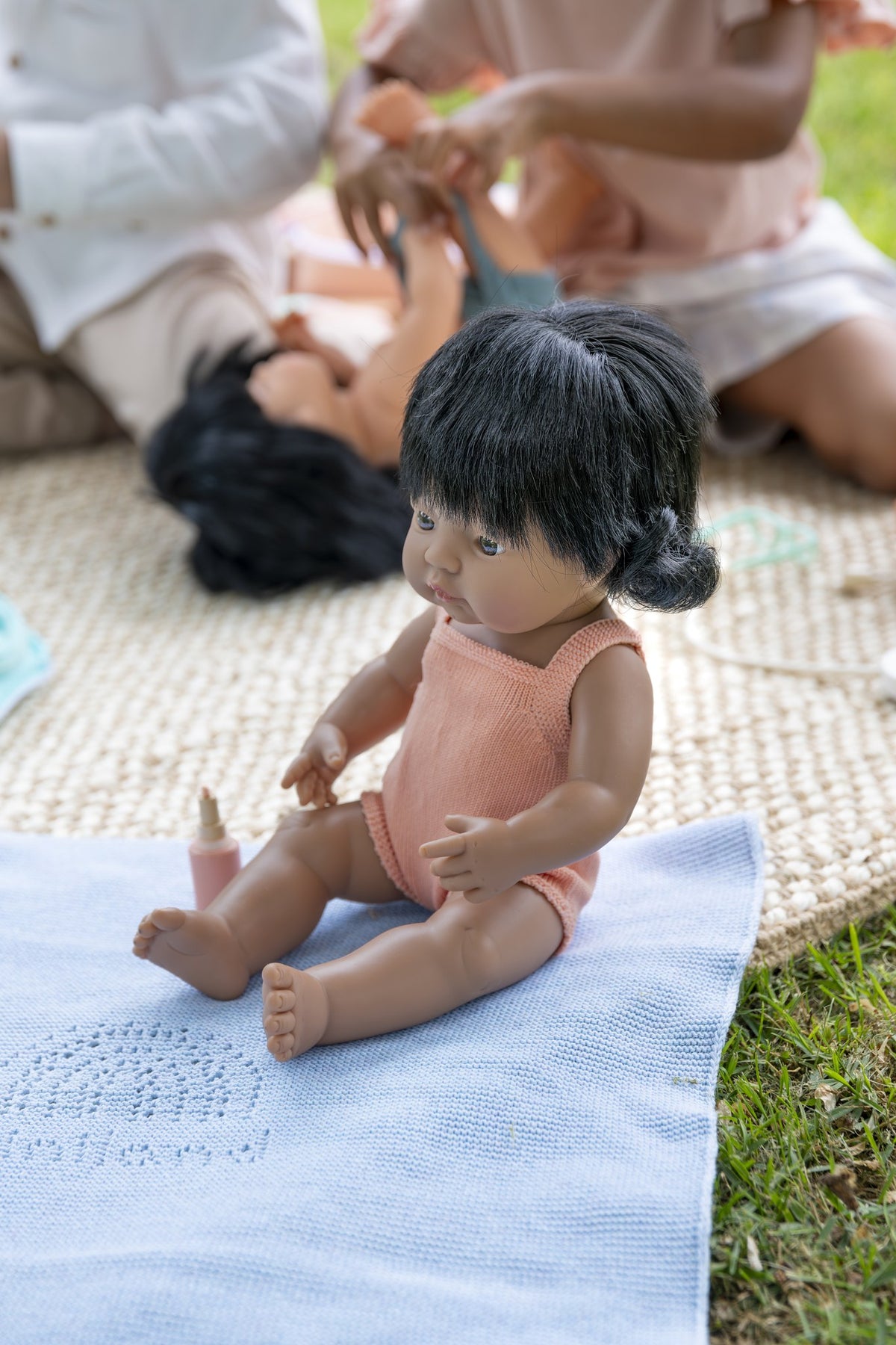 Baby Doll Hispanic Girl 15” (Salmon Rompers)