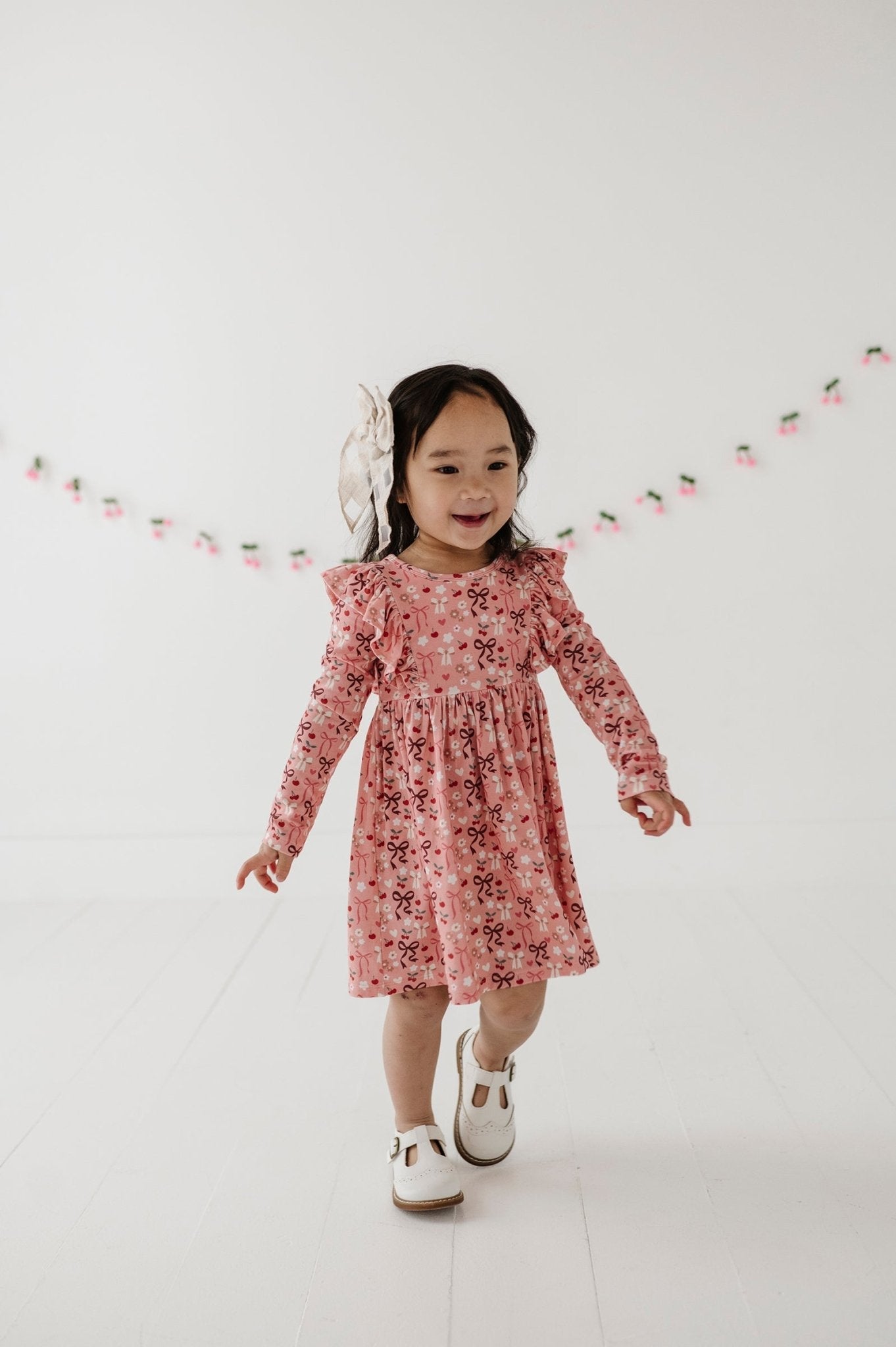 Girls Long Sleeve Ruffle Dress In Cherry Hearts