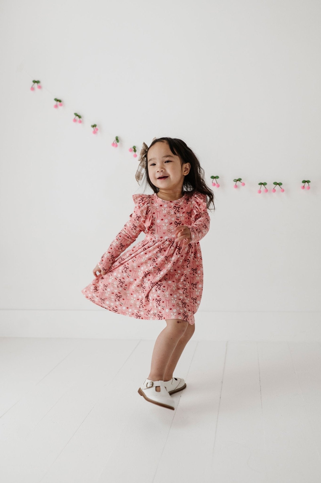 Girls Long Sleeve Ruffle Dress In Cherry Hearts