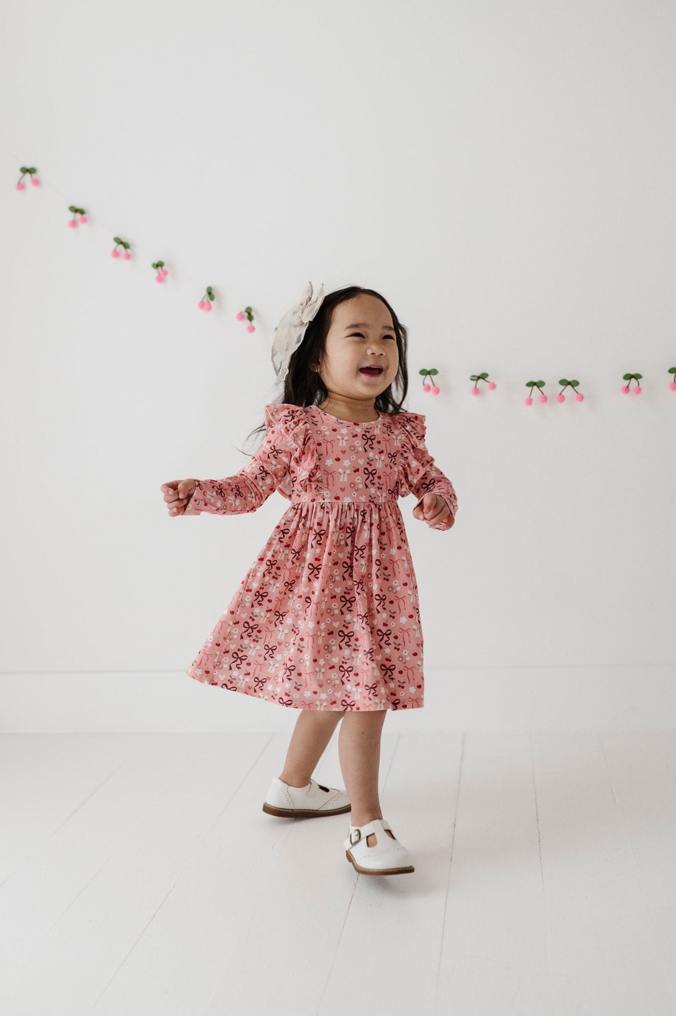 Girls Long Sleeve Ruffle Dress In Cherry Hearts