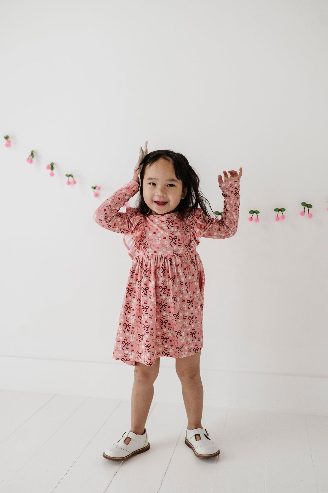 Girls Long Sleeve Ruffle Dress In Cherry Hearts
