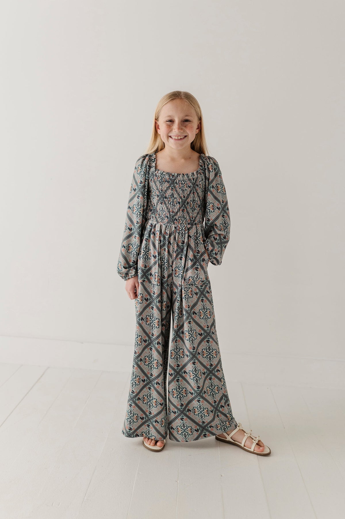Girls Smocking Knit Jumpsuit In Landon Ethnic Diamond