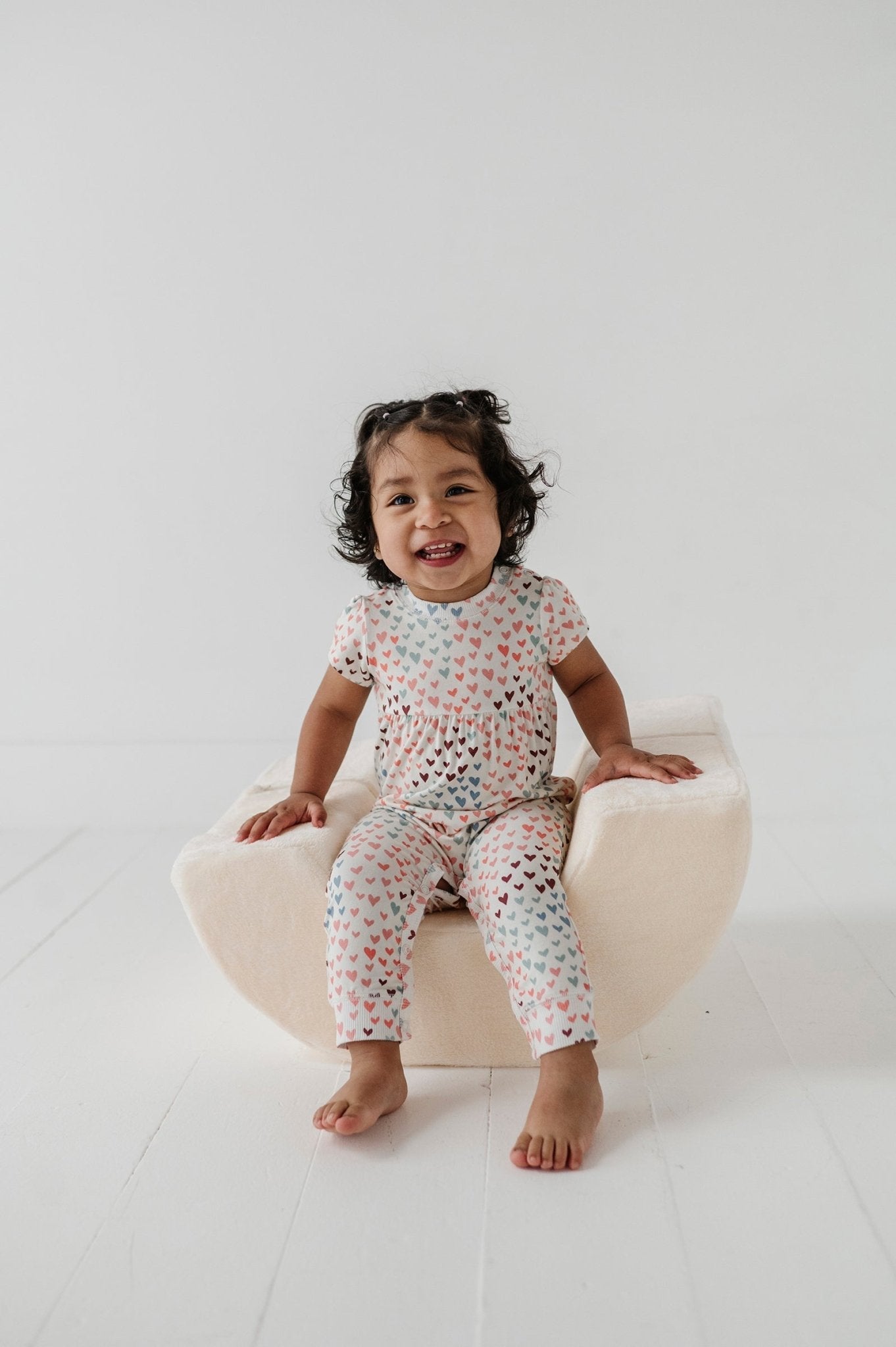 Baby Girl Short Sleeve Pant Romper In Rainbow Hearts