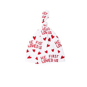 He First Loved Us Red Knotted Hat Cotton